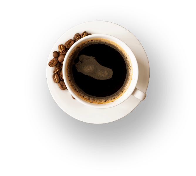 Top-down view of a white ceramic coffee cup with black coffee and roasted beans on a saucer